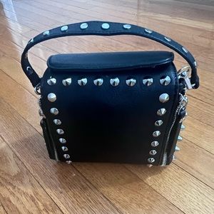 Black Rockstar bag! 🎸 Gently used and in great condition.